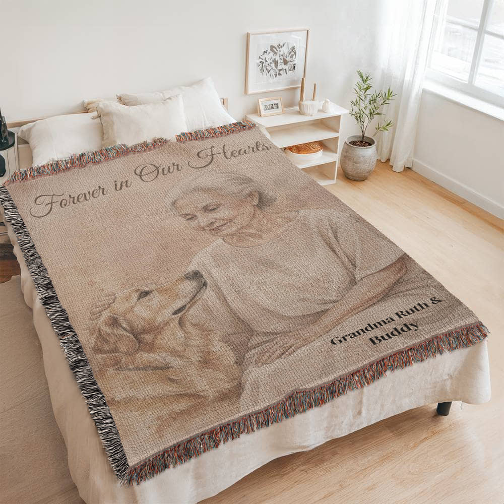 Woven portrait blanket draped on a cozy bedroom bed